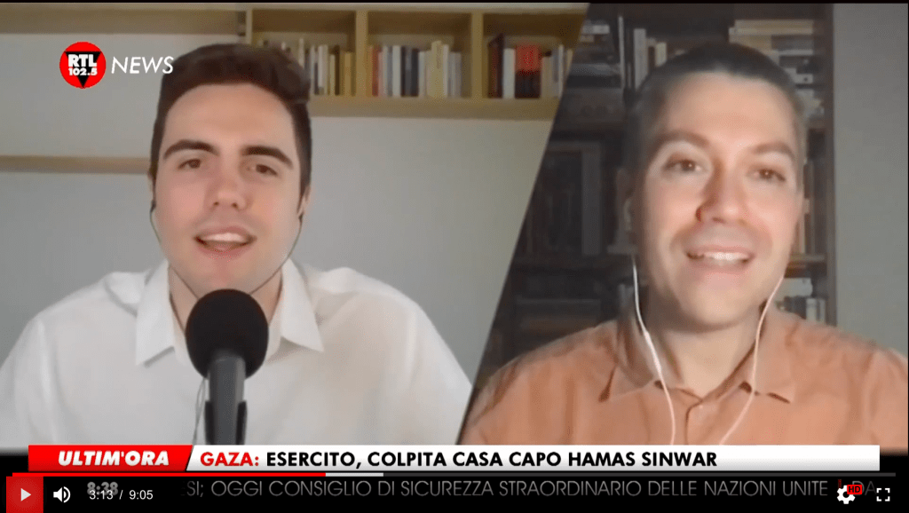 Schermata di una diretta su RTL 102.5 News con Dario Matassa in collegamento video durante la conduzione del programma TODAY.
